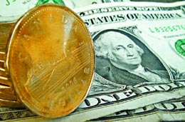 Weaker-loonie-hurts-more-than-it-helps